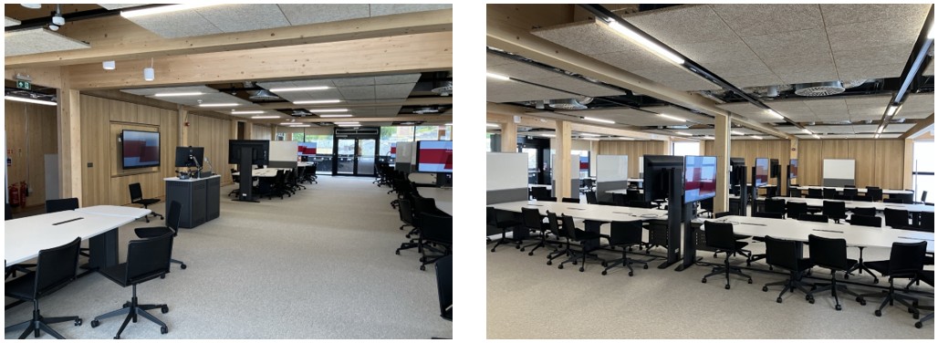 Groups of collaboration desks and chairs spaced around the room.